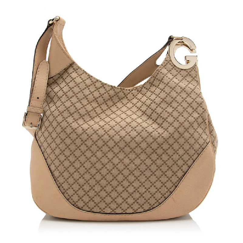 Ladies Gucci Dionysus bags in a pastel colorGucci Diamante Charlotte Medium Shoulder Bag