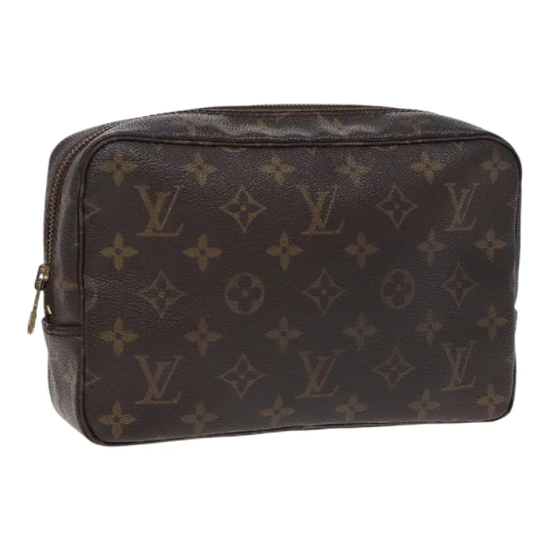 Louis Vuitton bags with a snap - button closure and a decorative charm for styleLOUIS VUITTON Trousse de Toilette Clutch Bag