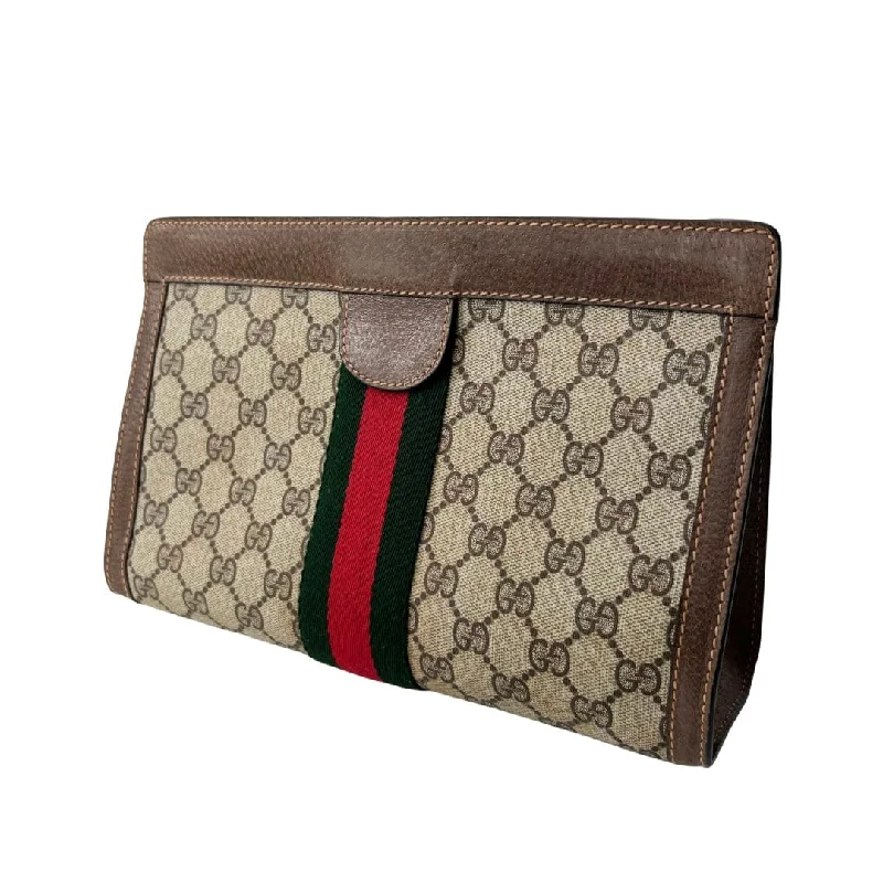 Women Gucci Sylvie bags with a monogram - embossed leatherGucci GG Supreme Web Clutch