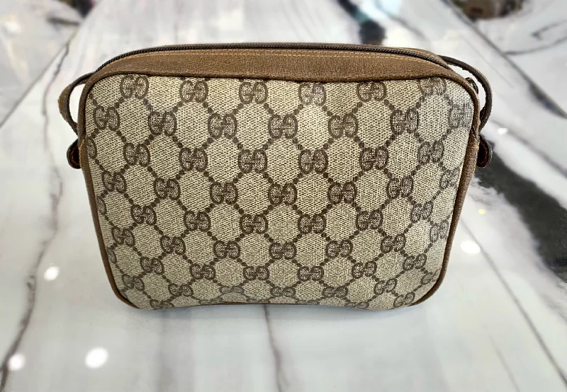 Ladies Gucci Dionysus bags with a detachable shoulder strapGUCCI MONOGRAM COATED CANVAS VINTAGE CROSSBODY