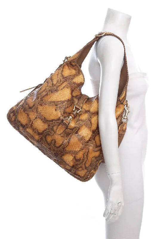 Ladies Gucci handbags with a detachable coin purse insideGucci Vintage Jackie Python Hobo