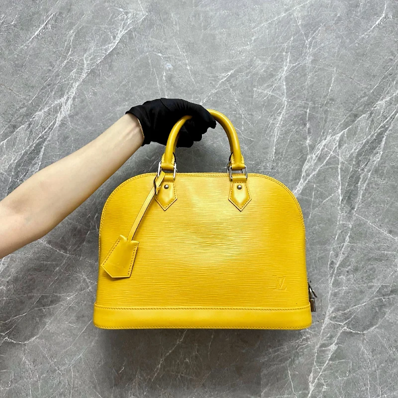 Louis Vuitton Twist bags with a crystal - embellished LV - turnlockLV Alma PM EPI Leather Yellow SHW