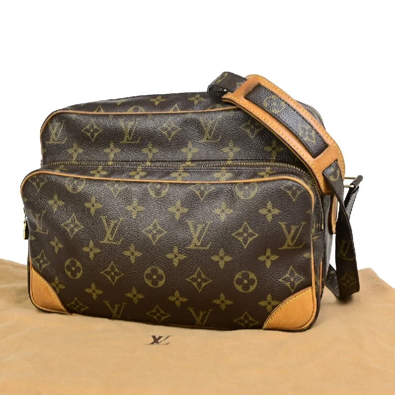 Louis Vuitton crossbody bags in a bold red color for a statementLOUIS VUITTON Nile Handbag