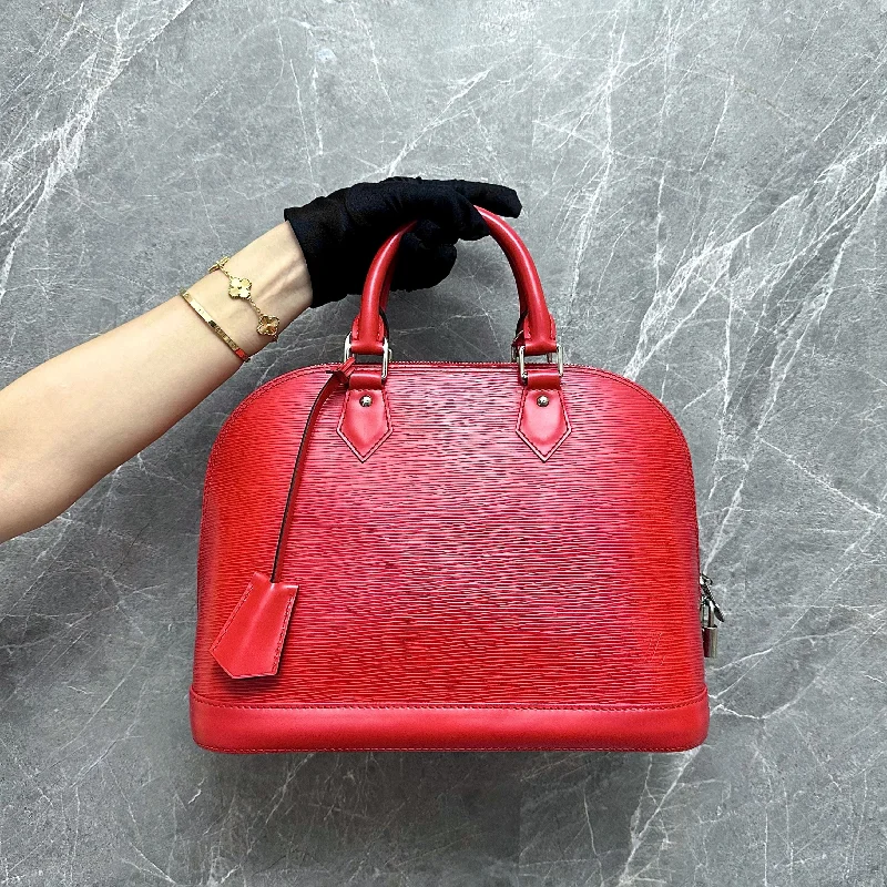 Louis Vuitton Twist bags with the iconic LV - turnlock closureLV Alma PM EPI Leather Red SHW