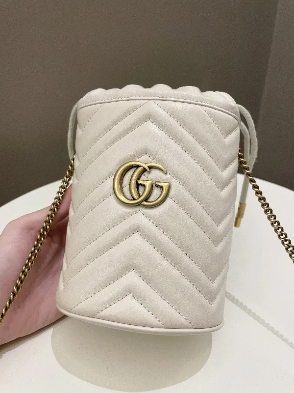 Ladies Gucci Dionysus bags with a star - shaped charmGucci Marmont Mini Bucket Bag Ivory