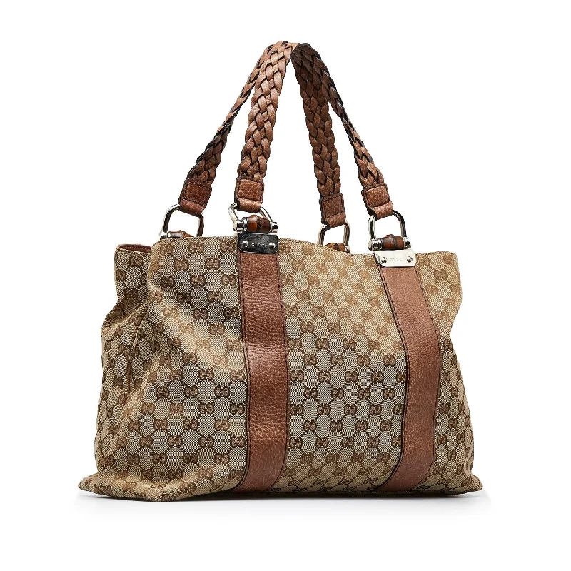 Women Gucci bags with interlocking G hardware for a classic lookGucci Medium GG Canvas Bamboo Bar Tote (SHG-OK721J)