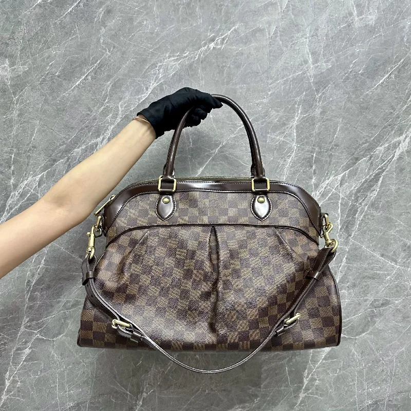 Louis Vuitton Twist bags with a crystal - embellished LV - turnlockLV Trevi GM Damier Ebene Shoulder Bag