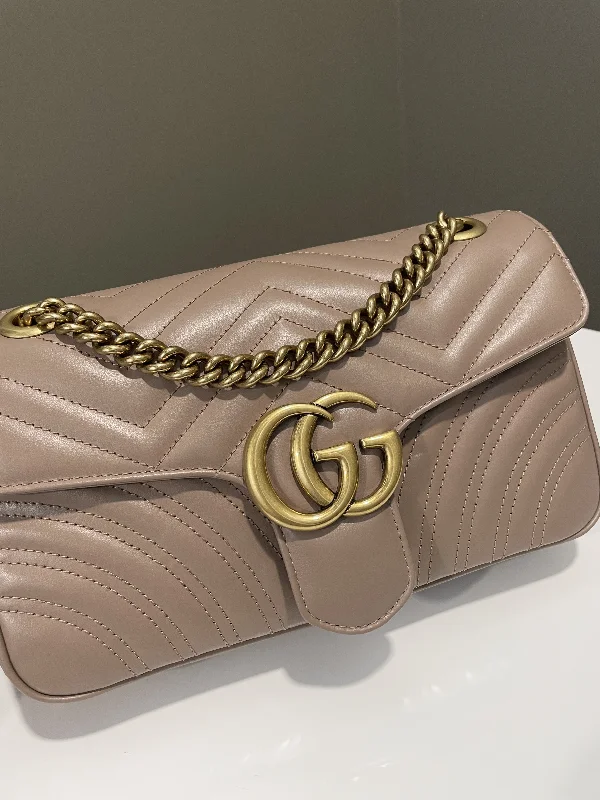 Women Gucci bags with interlocking G hardware for a classic lookGucci Marmont Flap Bag Beige