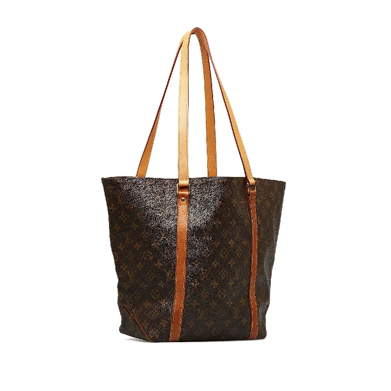 Louis Vuitton Twist bags with a crystal - embellished LV - turnlockBrown Louis Vuitton Monogram Sac Shopping Tote Bag