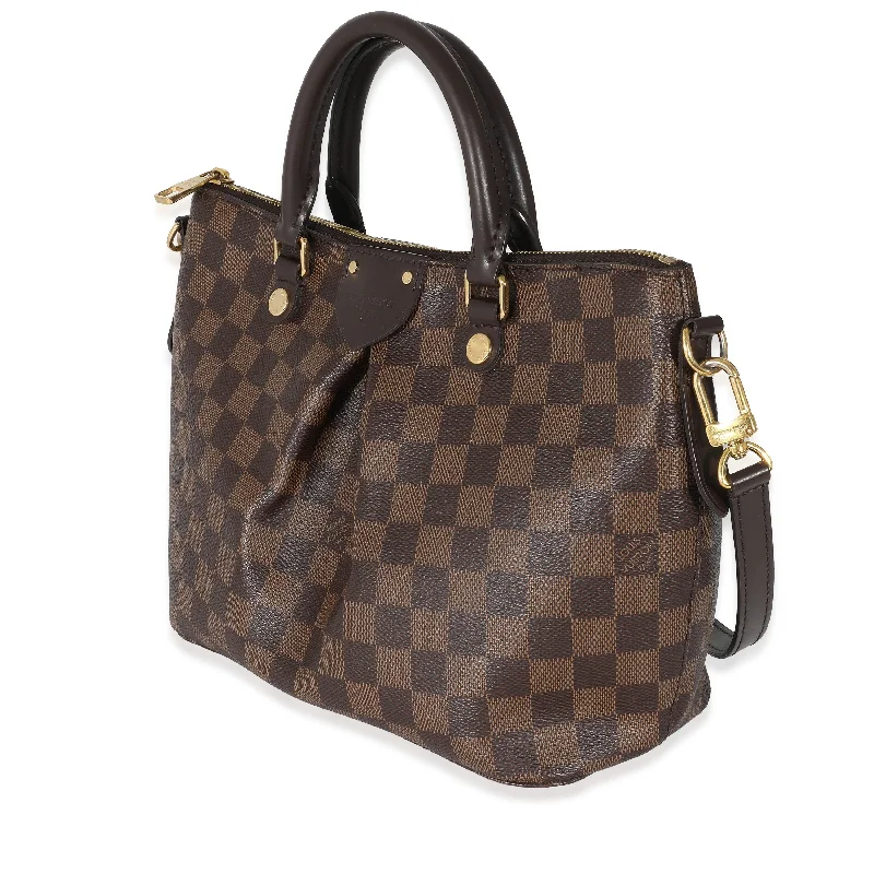 Louis Vuitton handbags with a patent - leather finish for a shiny lookLouis Vuitton Damier Ebene Canvas Siena PM