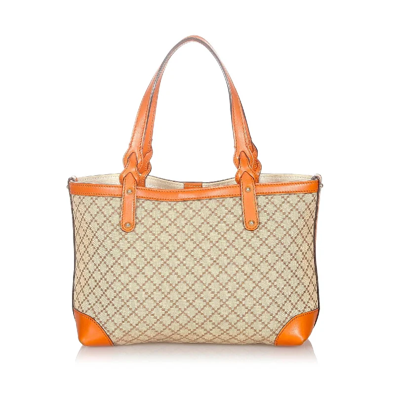 Women Gucci Sylvie bags with a monogram - embossed leatherGucci Diamante Craft Canvas Tote Bag (SHG-20797)