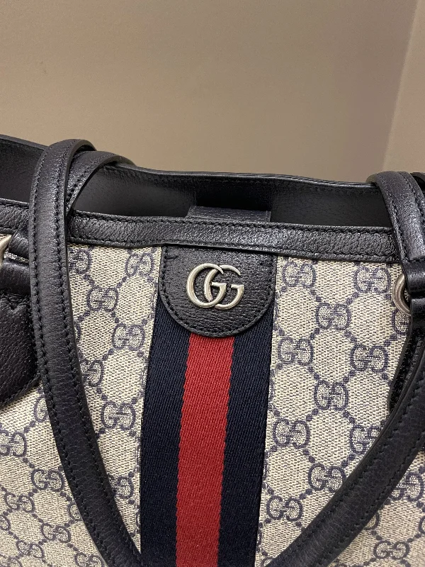 Ladies Gucci Dionysus bags with a star - shaped charmGucci Ophidia GG Tote Beige/ Blue GG Supreme Canvas