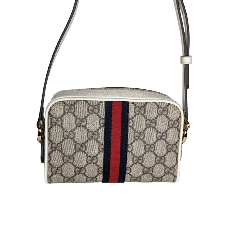 Women Gucci crossbody bags with a printed floral patternGucci GG Supreme Mini Ophidia Crossbody Bag