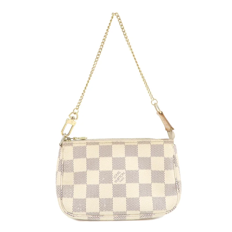 Louis Vuitton Alma bags with a monogram - embossed leather surfaceLouis Vuitton Damier Azur Mini Pochette Accessoires Pouch N58010