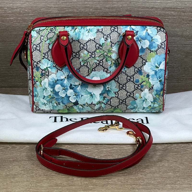 Ladies Gucci Dionysus bags in a pastel colorGucci Blue Bloom GG Coated Canvas Small Boston Bag