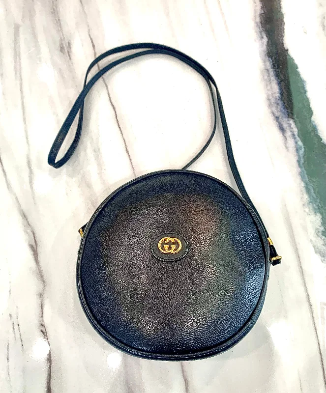 Women Gucci bags with interlocking G hardware for a classic lookGUCCI VINTAGE ROUND CANTEEN-STYLE LEATHER BAG