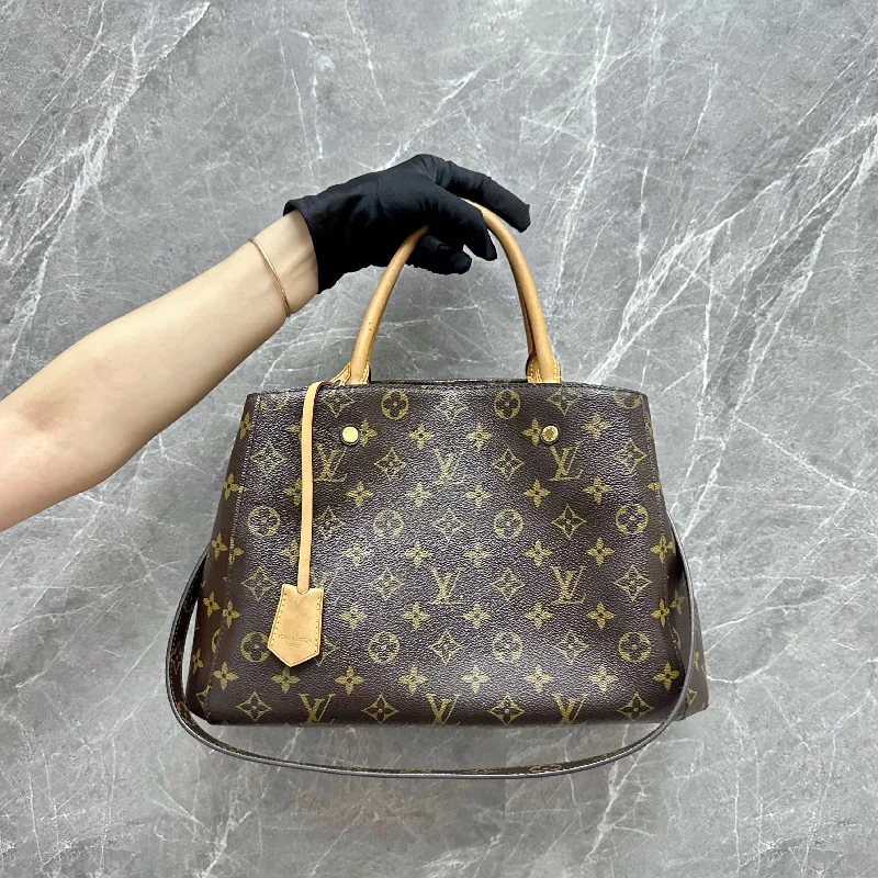 Louis Vuitton handbags with a patent - leather finish for a shiny lookLV Montaigne MM Monogram