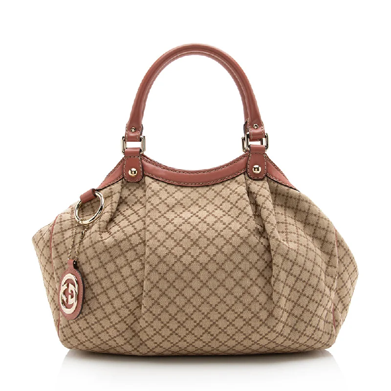 Women Gucci bags with a chain - link trim and a leather bodyGucci Diamante Canvas Sukey Medium Tote