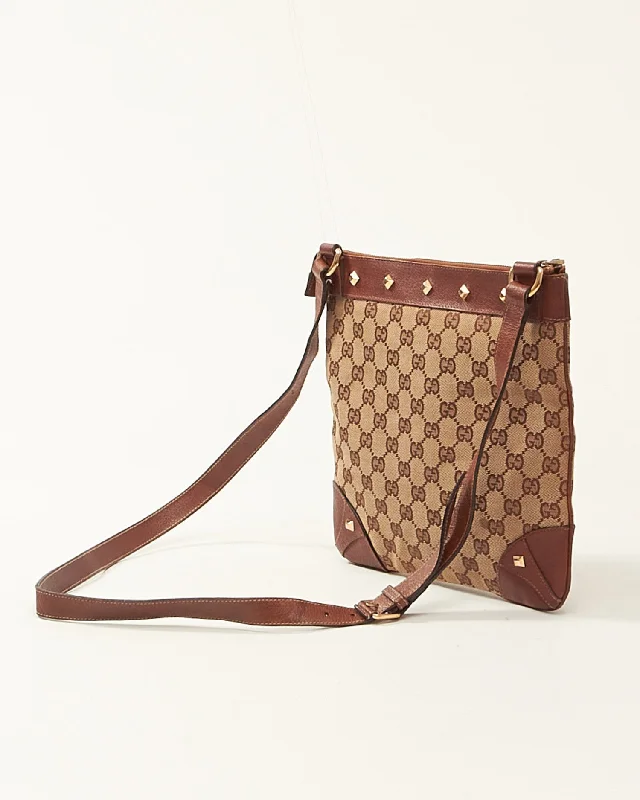 Women Gucci bags with a front - zip pocket for small itemsGucci GG Monogram Studded Crossbody Bag