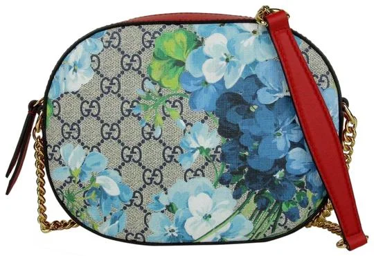 Ladies Gucci shoulder bags with a wide - width strapGucci GG Supreme Monogram Blooms Crossbody