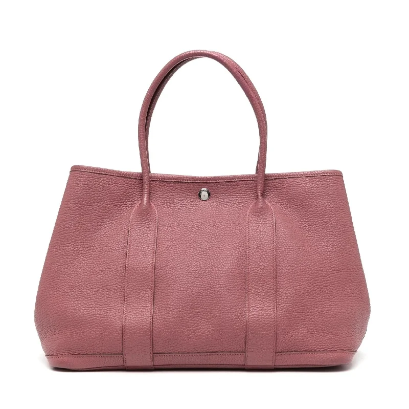 Hermès Kelly Bags with a two - tone leather design for visual interestGarden Party Tote GM Pink