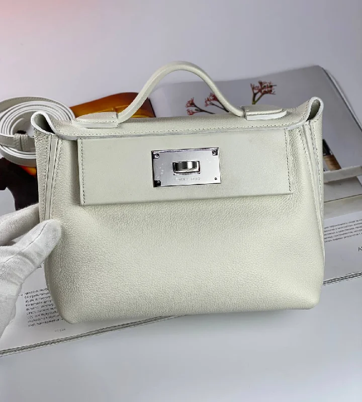 Hermès Kelly Bags with a chain - embellished handle for a modern twistHermes 24/24 Bag Evercolor with Swift 21 white palladium-platedHardware