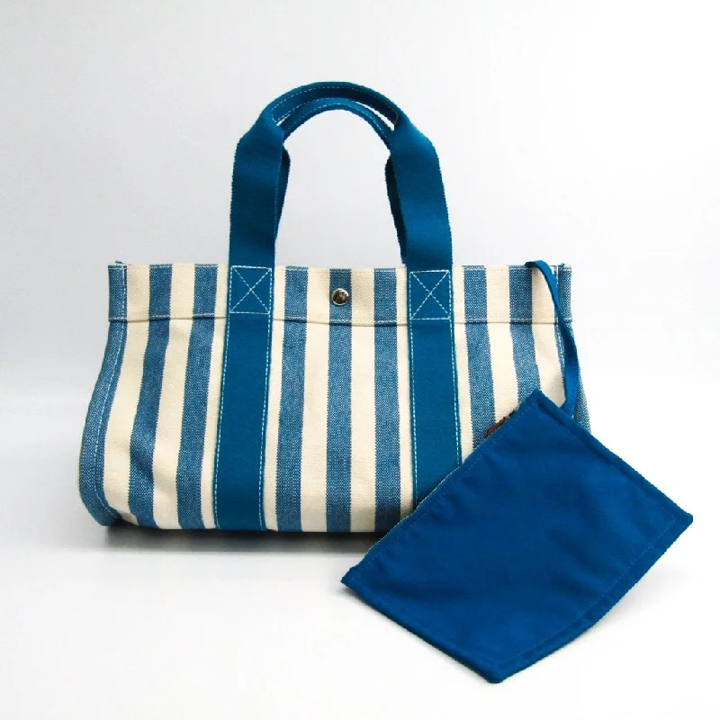 Hermès Kelly Bags with a hand - stitched leather handle for artisanal charmHermes Blue and White Canvas Cannes MM Tote (SHA16580)