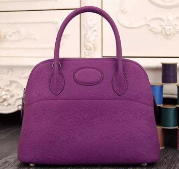 Hermès Kelly Bags in a rare shade of royal purple for a statementHermes Bolide 31cm Togo Leather Purple Bag