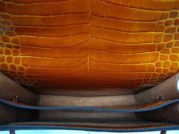 Hermès Kelly Bags with a monogram - embossed leather panelHermes Briefcases H1053 Unisex Briefcase Orange Handbag