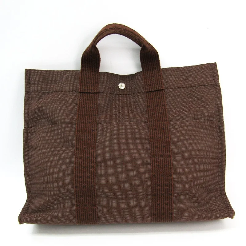 Hermès Kelly Bags with a leather - wrapped turnlock for added eleganceHermes Brown Herline MM Tote (SHA-35853)