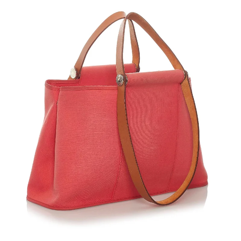 Hermès Kelly Bags with palladium - toned hardware for a modern aestheticHermes Cabag Elan Canvas Satchel (SHG-28864)