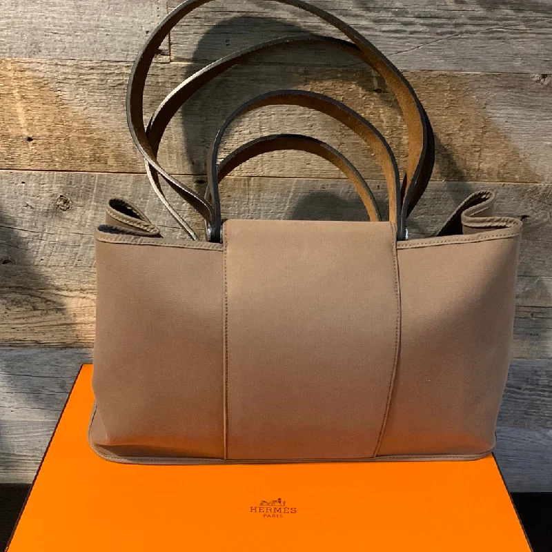 Hermès Kelly Bags in a rich chocolate brown for a sophisticated appearanceHermes Cabag Elan Tote