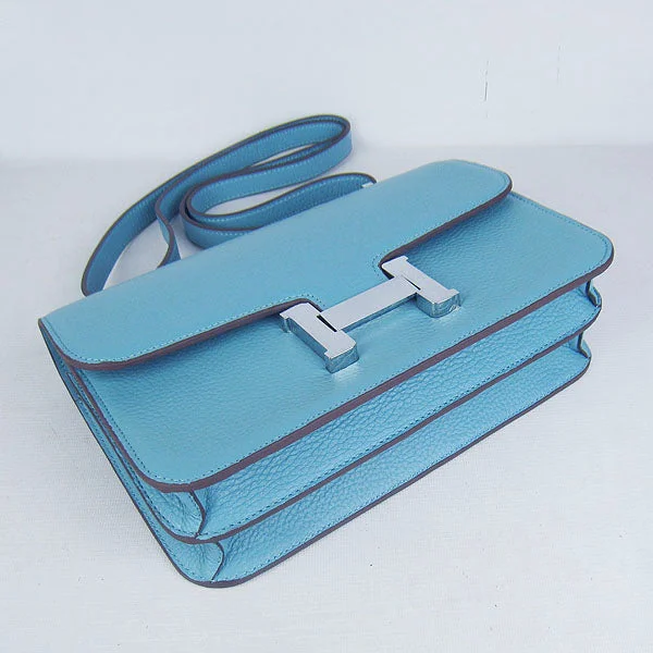 Hermès Kelly Bags with a braided leather handle for a bohemian touchHermes calf Leather Message Bag H020 light blue silver