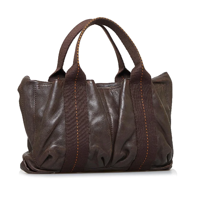 Hermès Kelly Bags with a detachable mirror insideHermes Caravan Horizontal Tote (SHG-gOdU5d)