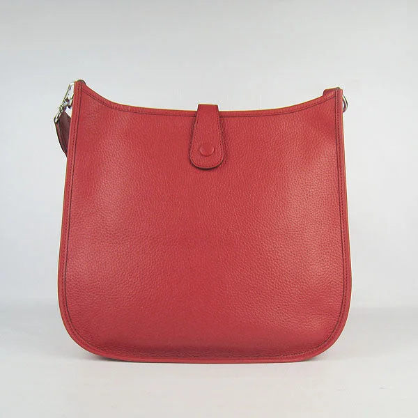 Hermès Kelly Bags in a bold tomato red for a fashion - forward statementHermes Evelyne I handbag H6309 red silver