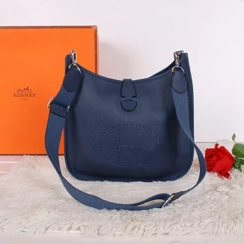 Hermès Kelly Bags with an embossed leather pattern for added textureHermes Evelyne III Crossbody Bag PM Dark Blue